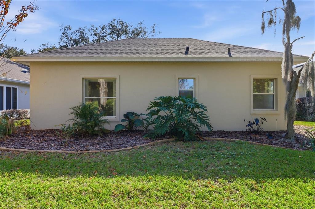 6301 West Glynborne Loop Crystal River, FL 34429 - Photo 43 of 63 a view of a house with a garden