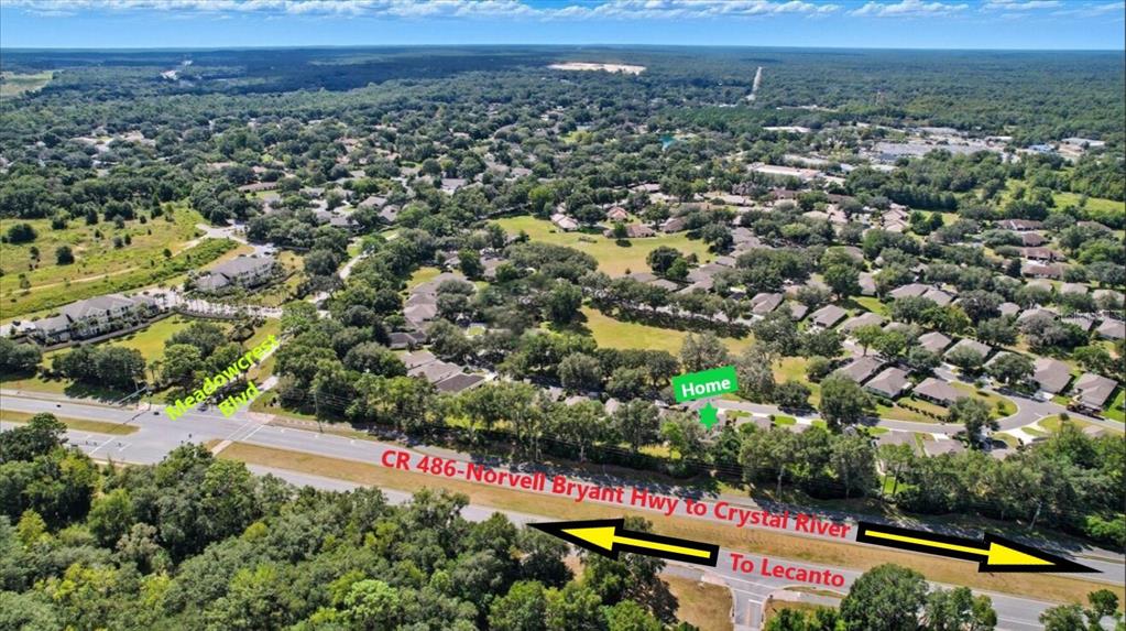 6301 West Glynborne Loop Crystal River, FL 34429 - Photo 51 of 63 an aerial view of residential houses with outdoor space and swimming pool