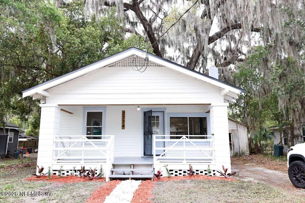 2774 Fitzgerald Street Jacksonville, FL 32254 - Photo 2 of 15 a front view of a house with a yard