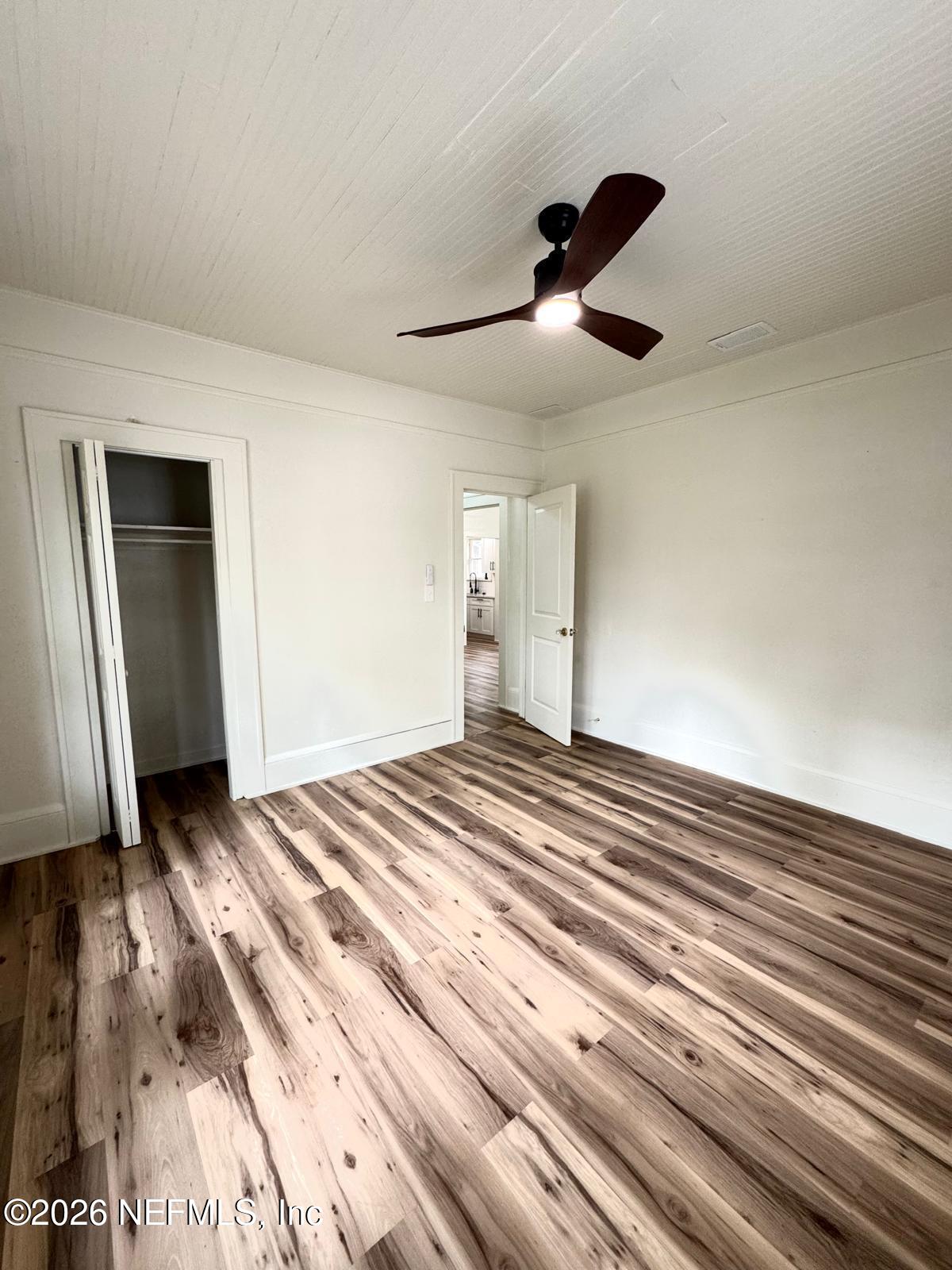 2774 Fitzgerald Street Jacksonville, FL 32254 - Photo 7 of 15 a view of empty room with wooden floor