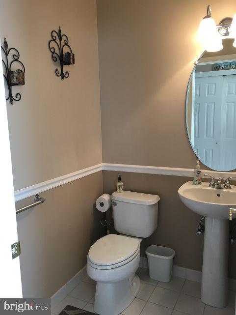 42 Hill Road Warminster, PA 18974 - Photo 23 of 44 a bathroom with a toilet sink and mirror