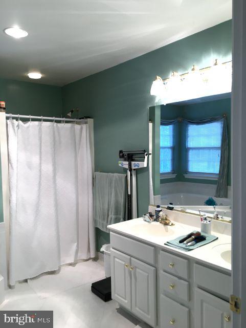 42 Hill Road Warminster, PA 18974 - Photo 29 of 44 a bathroom with a sink and a mirror