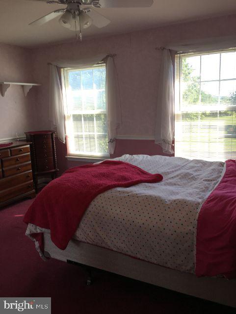42 Hill Road Warminster, PA 18974 - Photo 32 of 44 a bedroom with a bed and a window