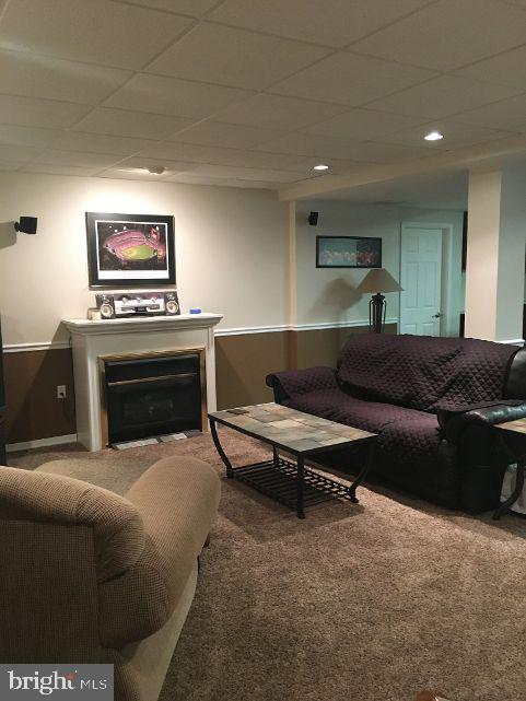 42 Hill Road Warminster, PA 18974 - Photo 37 of 44 a living room with furniture and a fireplace
