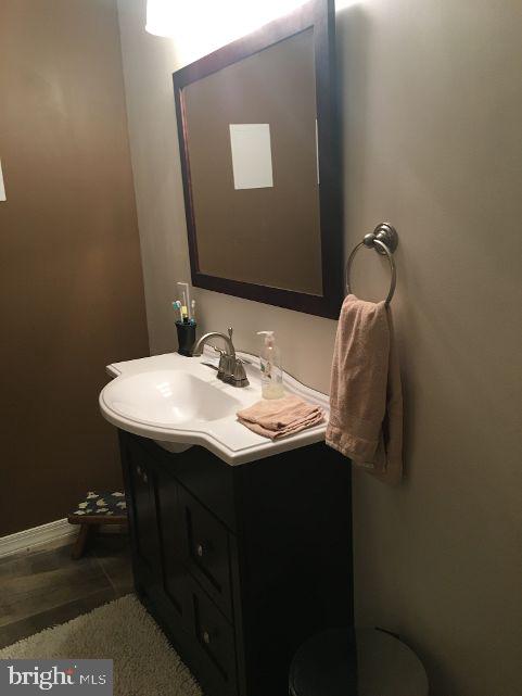 42 Hill Road Warminster, PA 18974 - Photo 42 of 44 a bathroom with a sink and a mirror