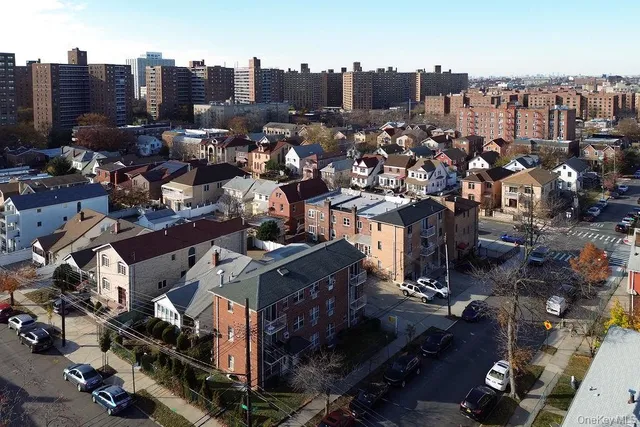 an aerial view of a city with lots of residential buildings