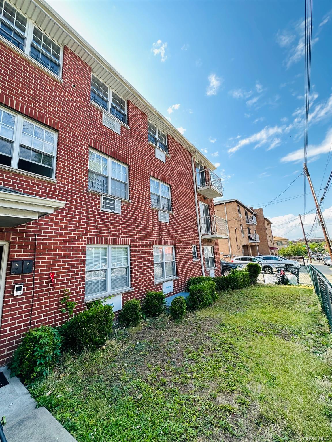 62-66 102nd Street Queens, NY 11374 - Photo 15 of 15 a front view of a building with garden