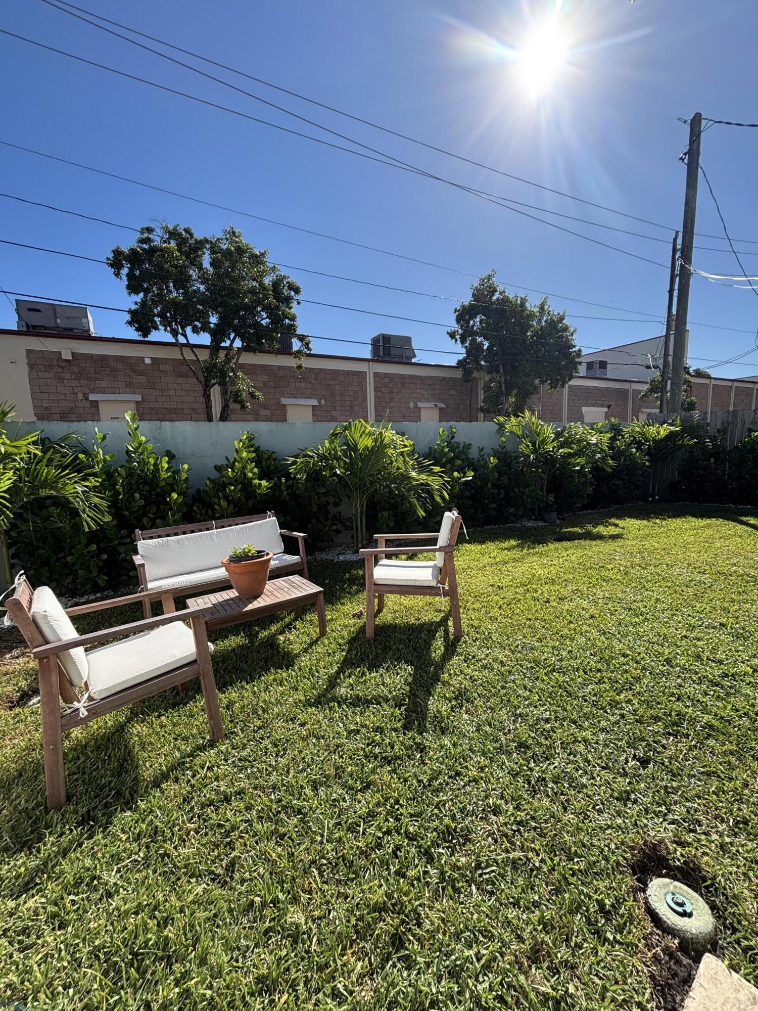 262 Southeast 9th Avenue, Unit C Deerfield Beach, FL 33441 - Photo 4 of 12 a view of a backyard with sitting area