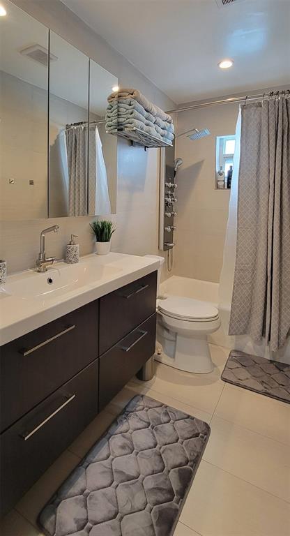 4154 Southwest 49th Street Dania Beach, FL 33314 - Photo 11 of 30 a bathroom with a sink toilet and shower