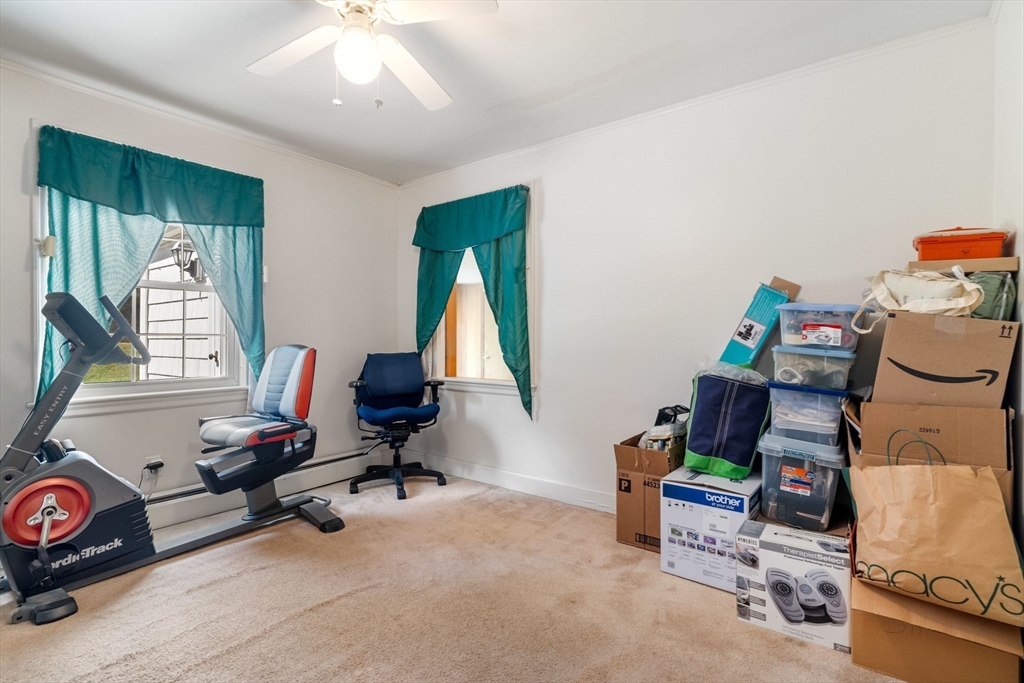 25 Centre Lane Milton, MA 02186 - Photo 17 of 32 a room with furniture a rug and a window