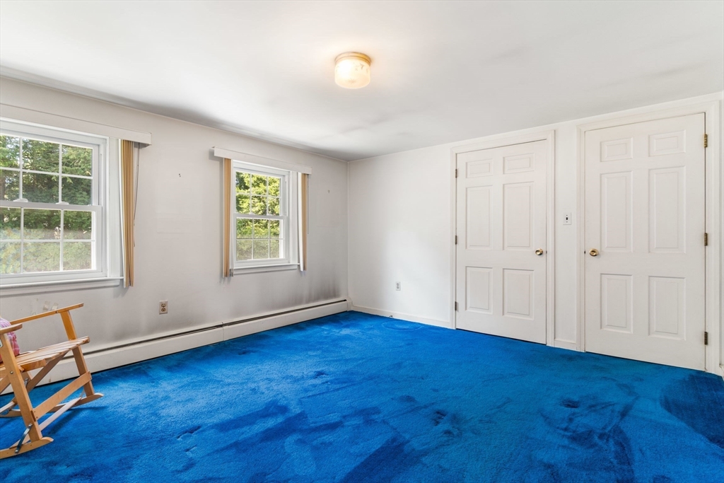 25 Centre Lane Milton, MA 02186 - Photo 20 of 32 wooden floor in an empty room with a window