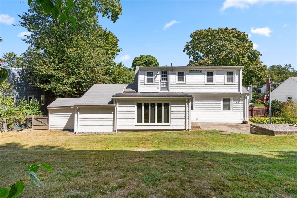 25 Centre Lane Milton, MA 02186 - Photo 27 of 32 a front view of a house with a garden