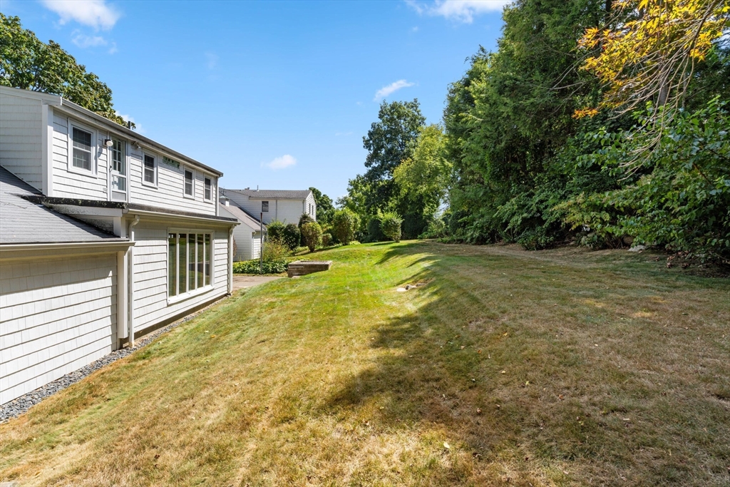 25 Centre Lane Milton, MA 02186 - Photo 29 of 32 a view of a house with a yard