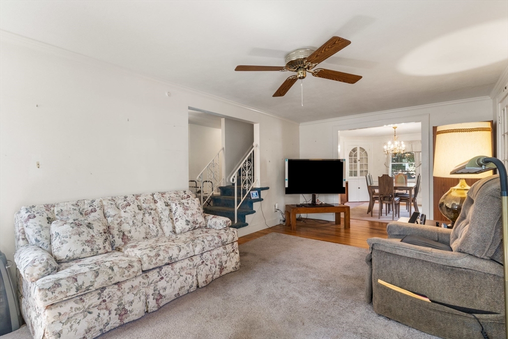 25 Centre Lane Milton, MA 02186 - Photo 3 of 32 a living room with furniture and a flat screen tv