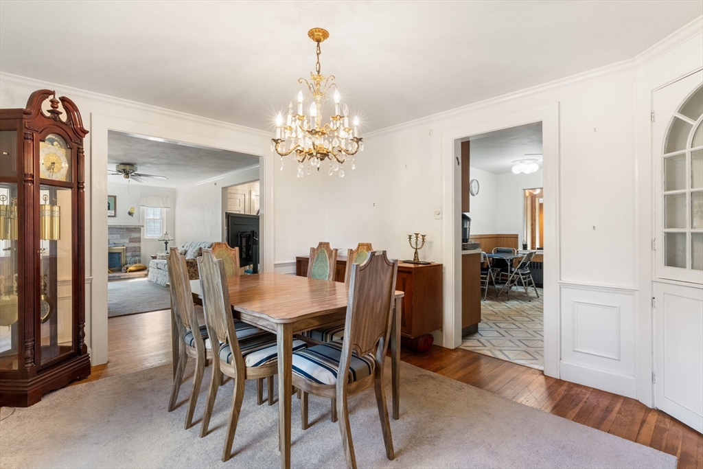 25 Centre Lane Milton, MA 02186 - Photo 7 of 32 a view of a dining room with furniture and wooden floor