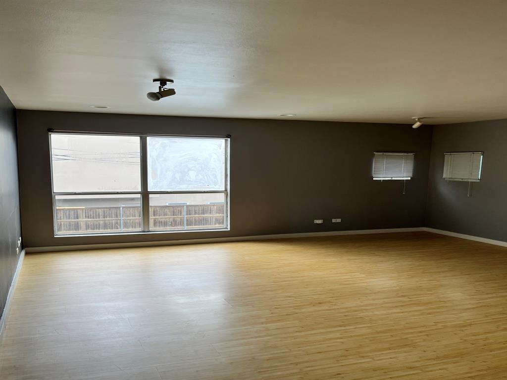 4343 Travis Street, Unit 10 Dallas, TX 75205 - Photo 2 of 10 a view of an empty room with a window