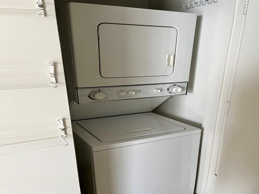 4343 Travis Street, Unit 10 Dallas, TX 75205 - Photo 5 of 10 a utility room with dryer and washer