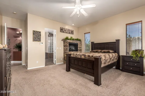 a spacious bathroom with a double vanity sink and a mirror