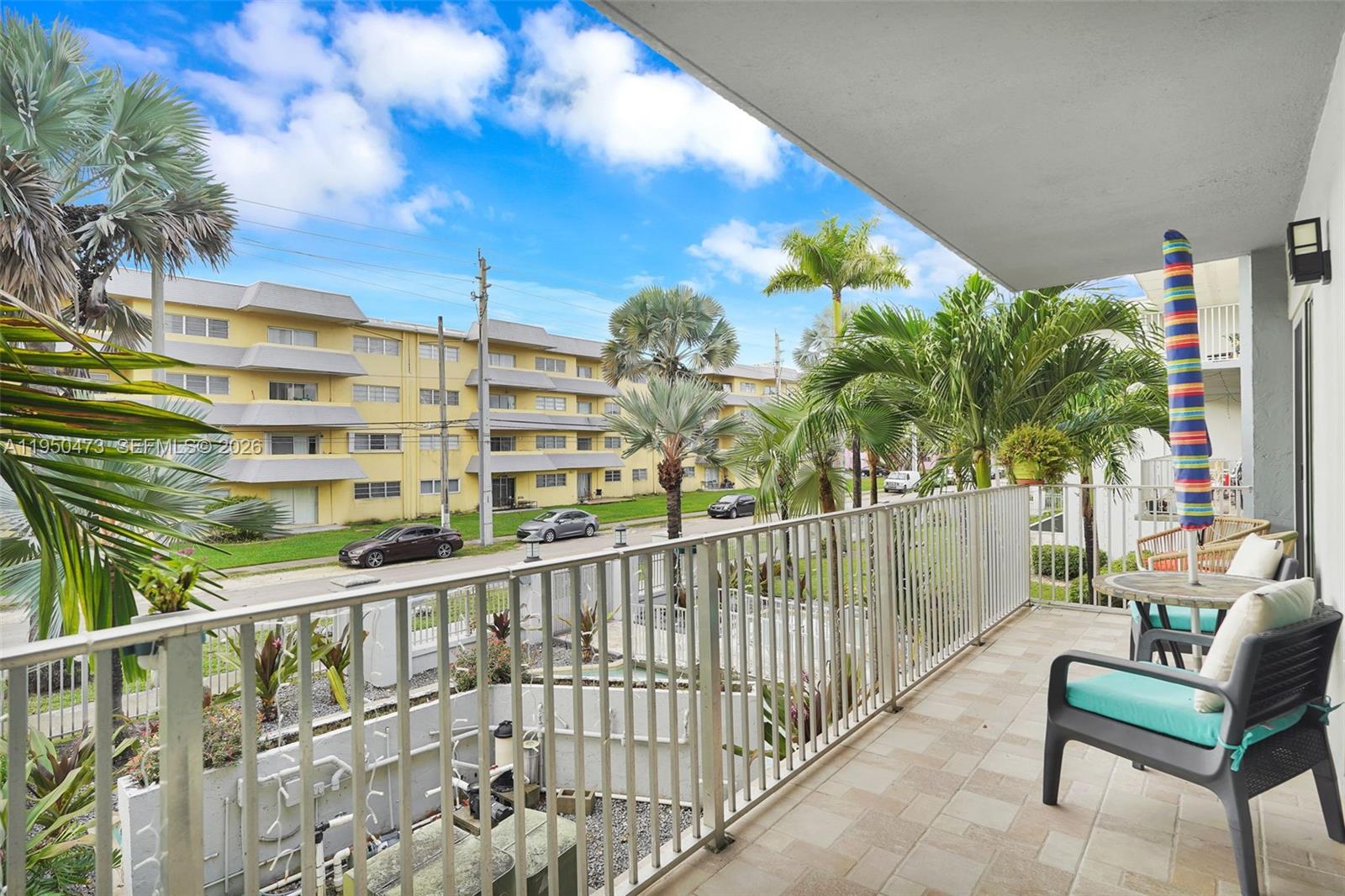 7401 Southwest 82nd Street, Unit 202S Miami, FL 33143 - Photo 11 of 39 a view of building from balcony