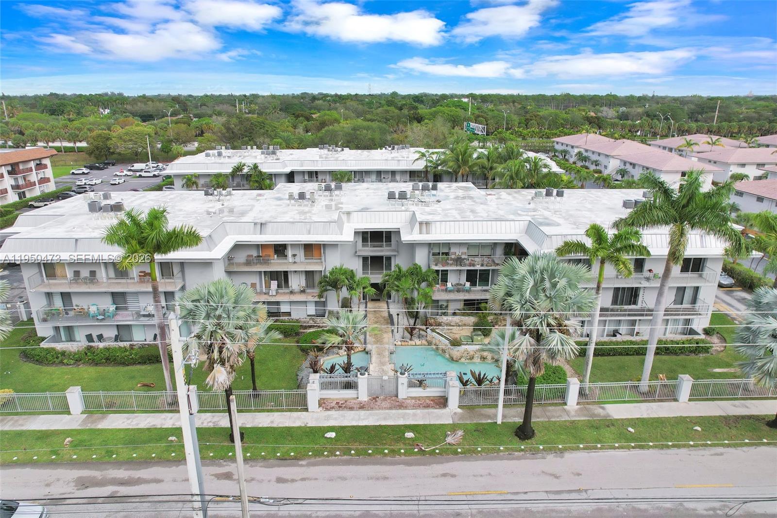 7401 Southwest 82nd Street, Unit 202S Miami, FL 33143 - Photo 26 of 39 a view of a city & building