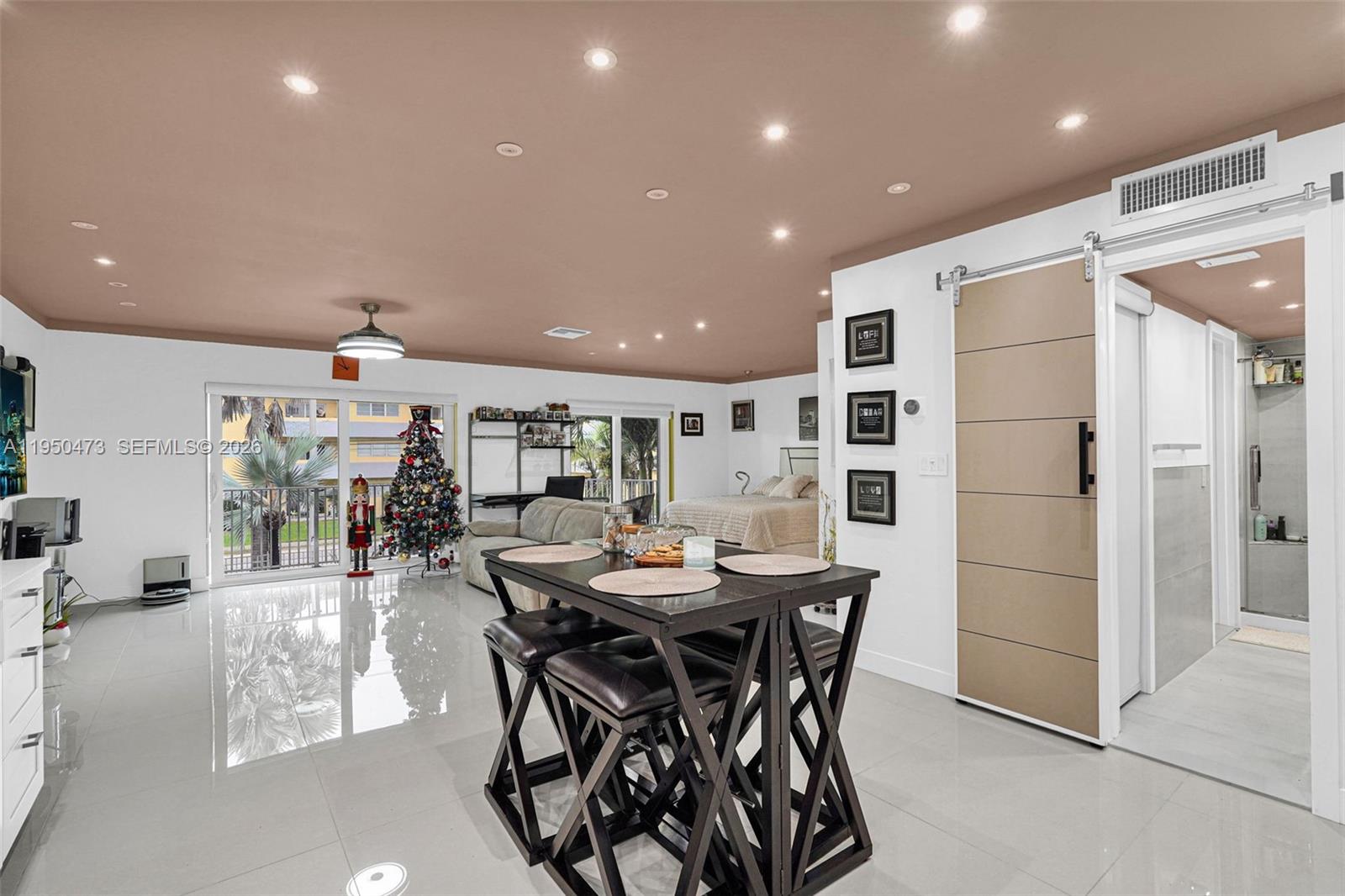 7401 Southwest 82nd Street, Unit 202S Miami, FL 33143 - Photo 35 of 39 a view of a dining area with furniture