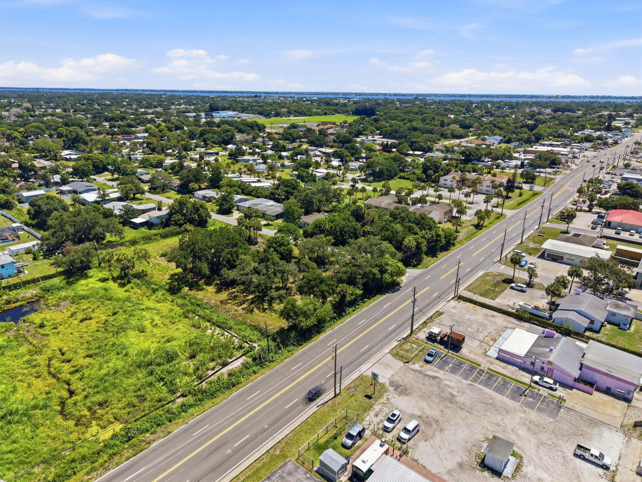 0 Aurora Road Melbourne, FL 32935 - Photo 20 of 20 an aerial view of residential houses with outdoor space
