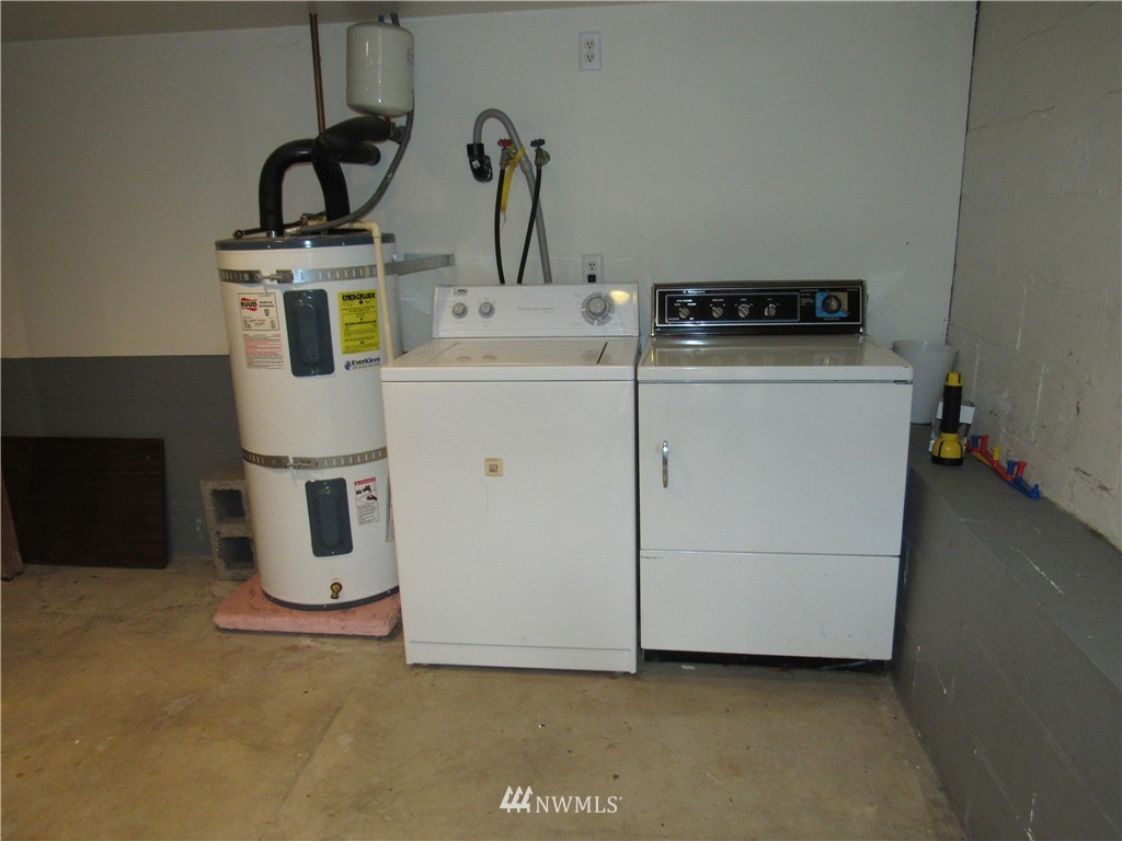 2107 Northeast 9th Street Renton, WA 98056 - Photo 14 of 19 a utility room with dryer and washer