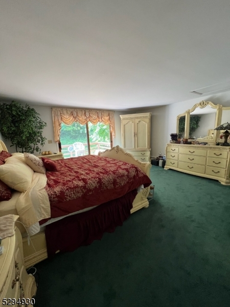 7 Martin Street Newton, NJ 07860 - Photo 14 of 16 a bed sitting in a bedroom next to a window