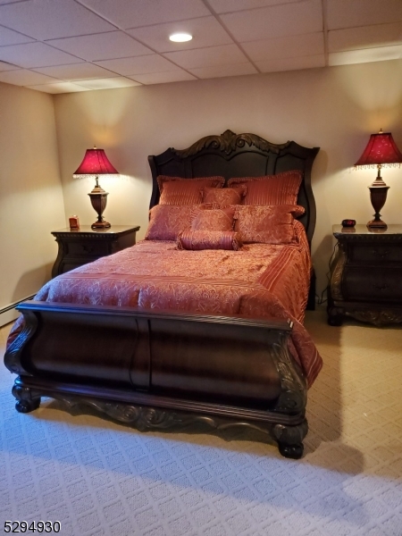 7 Martin Street Newton, NJ 07860 - Photo 6 of 16 a bedroom with a bed and window