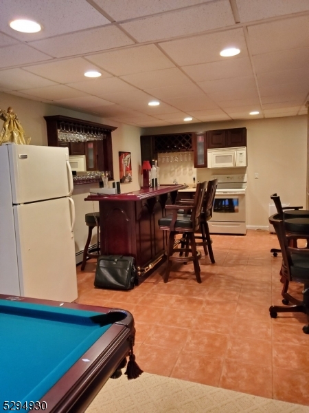 7 Martin Street Newton, NJ 07860 - Photo 8 of 16 a room with furniture pool table and a table