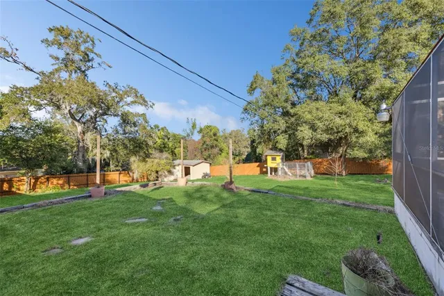 a view of a backyard with a garden