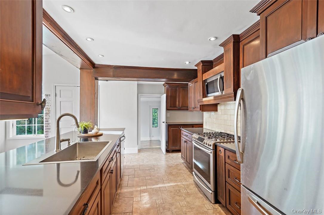 246 Mamaroneck Road Scarsdale, NY 10583 - Photo 14 of 35 Kitchen equipped with stainless steel appliances