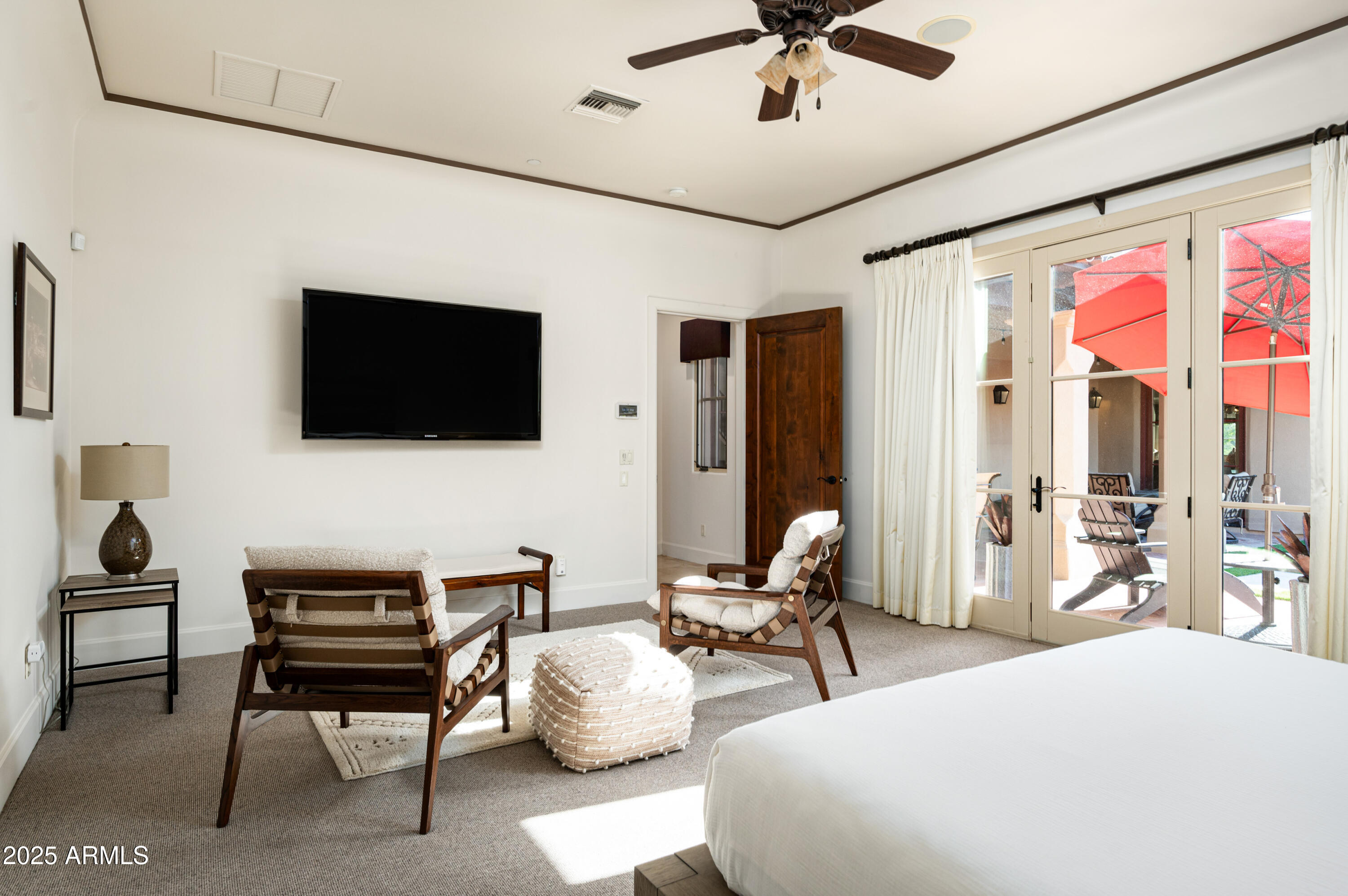 20263 North 102nd Place Scottsdale, AZ 85255 - Photo 19 of 58 a living room with furniture and a flat screen tv
