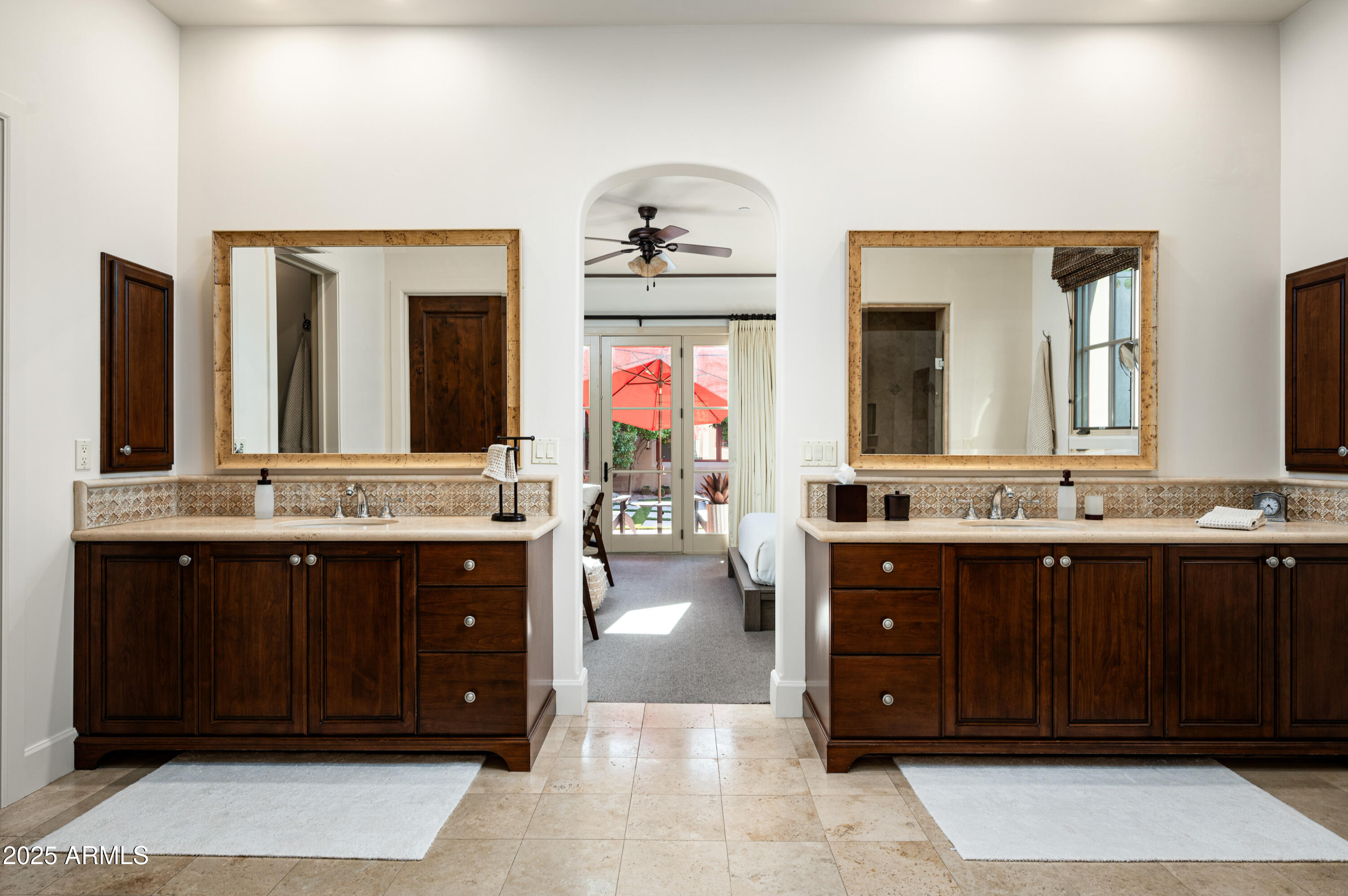 20263 North 102nd Place Scottsdale, AZ 85255 - Photo 21 of 58 a spacious bathroom with a vanity a sink a large mirror and a bathtub