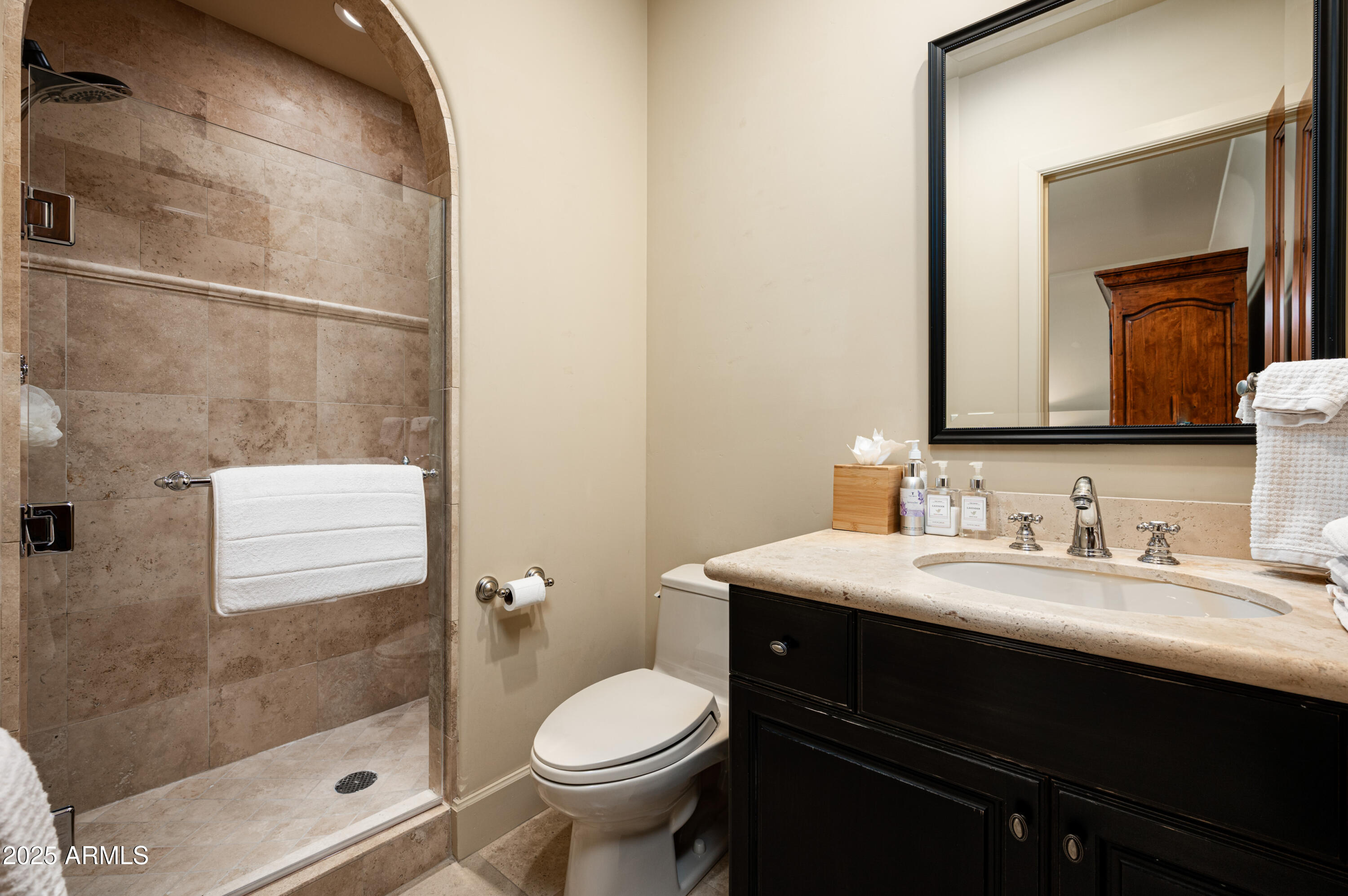 20263 North 102nd Place Scottsdale, AZ 85255 - Photo 31 of 58 a bathroom with a sink and a mirror