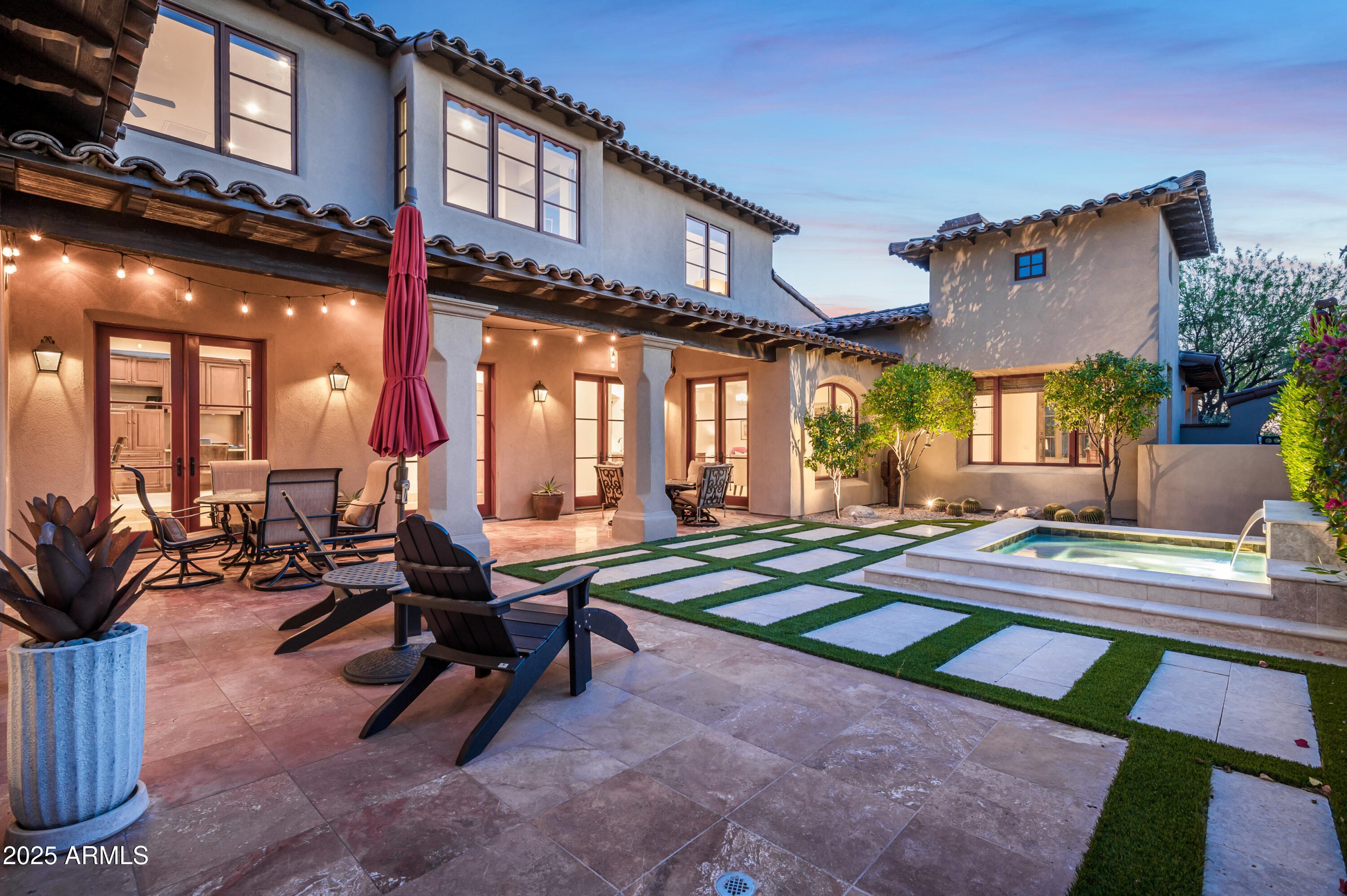 20263 North 102nd Place Scottsdale, AZ 85255 - Photo 36 of 58 a view of a patio with swimming pool table and chairs