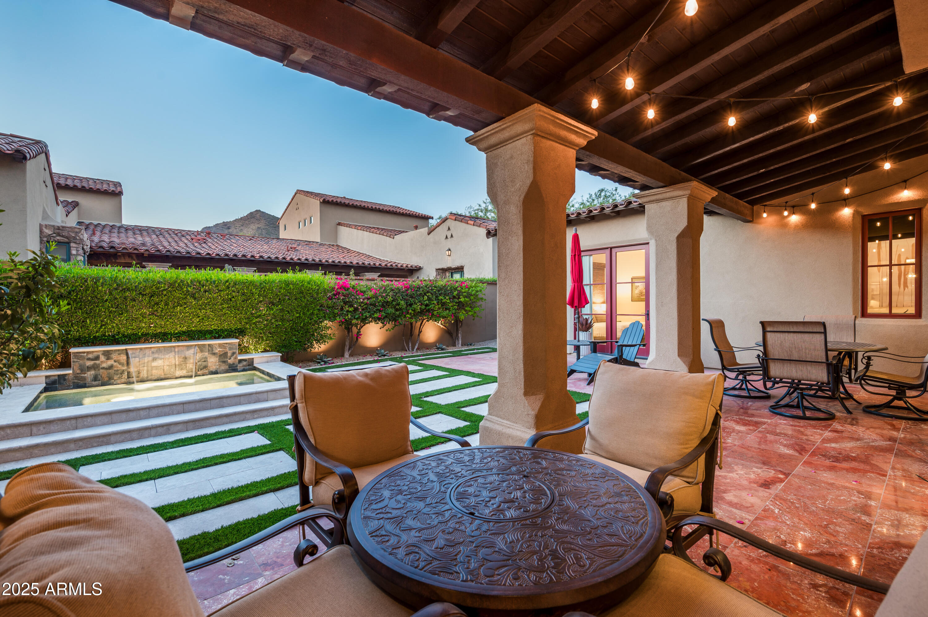 20263 North 102nd Place Scottsdale, AZ 85255 - Photo 39 of 58 a view of a porch with furniture and a yard