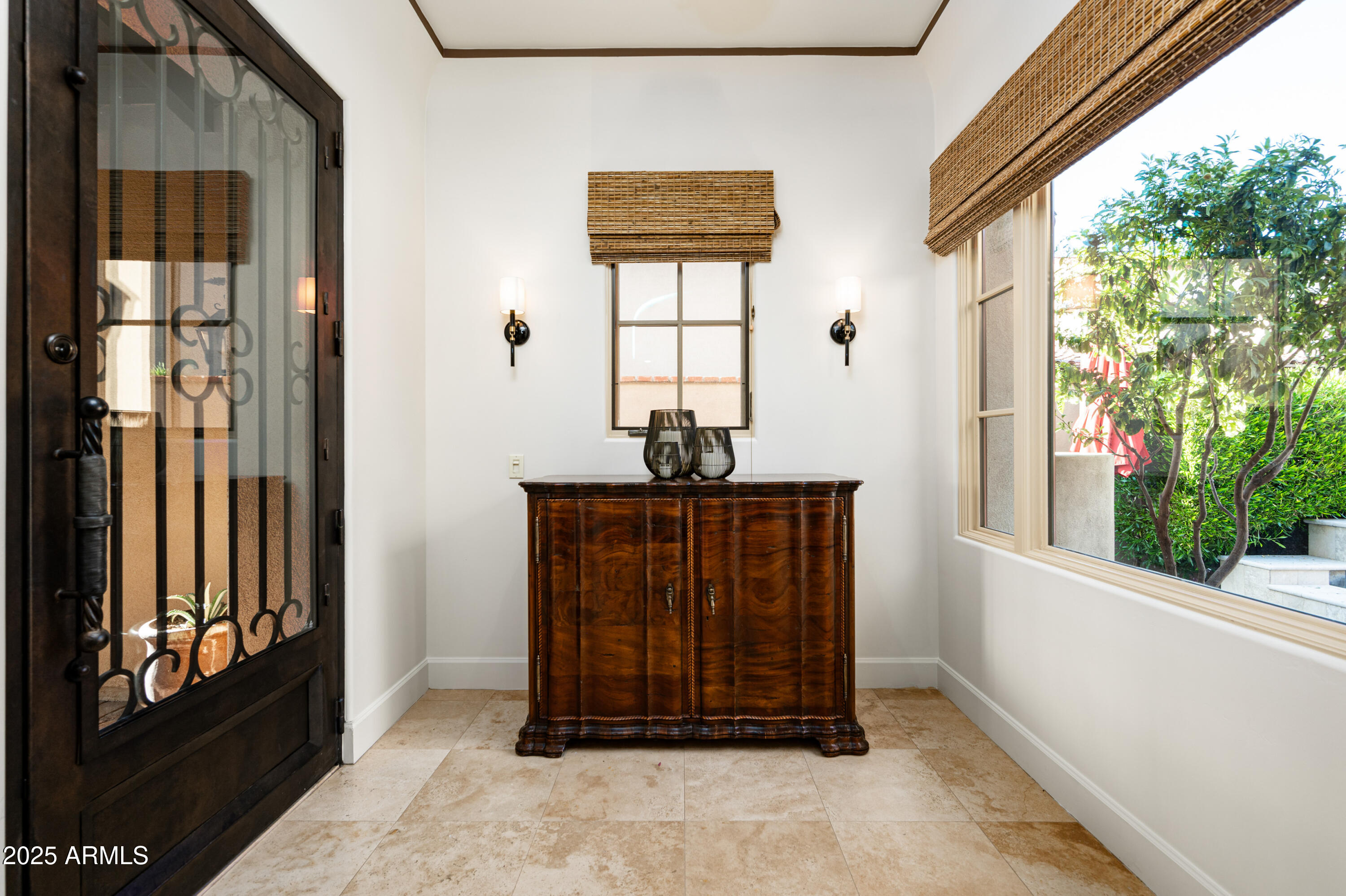 20263 North 102nd Place Scottsdale, AZ 85255 - Photo 4 of 58 a view of a entryway door of the house