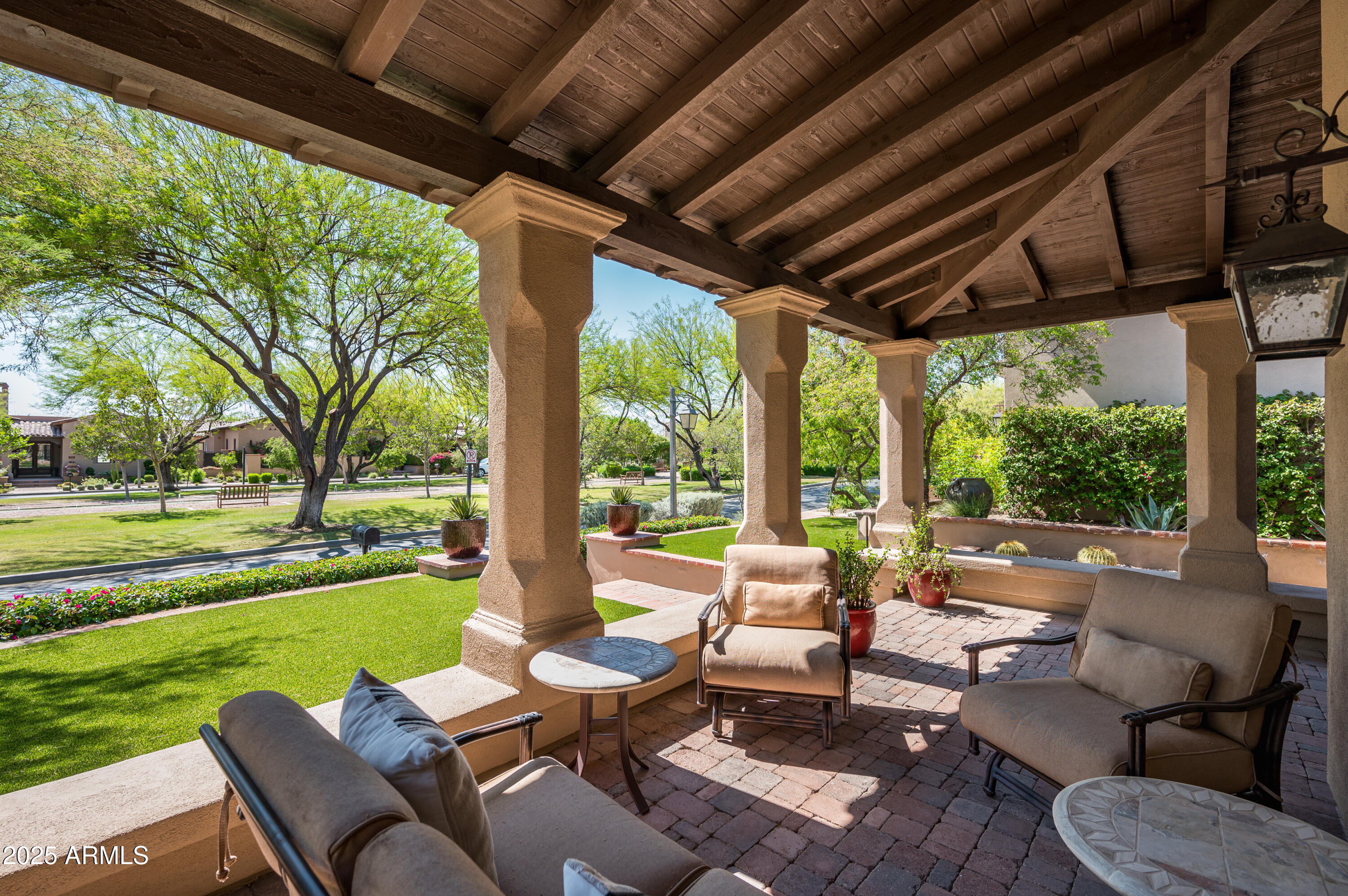 20263 North 102nd Place Scottsdale, AZ 85255 - Photo 48 of 58 a building outdoor space with patio couches and chairs