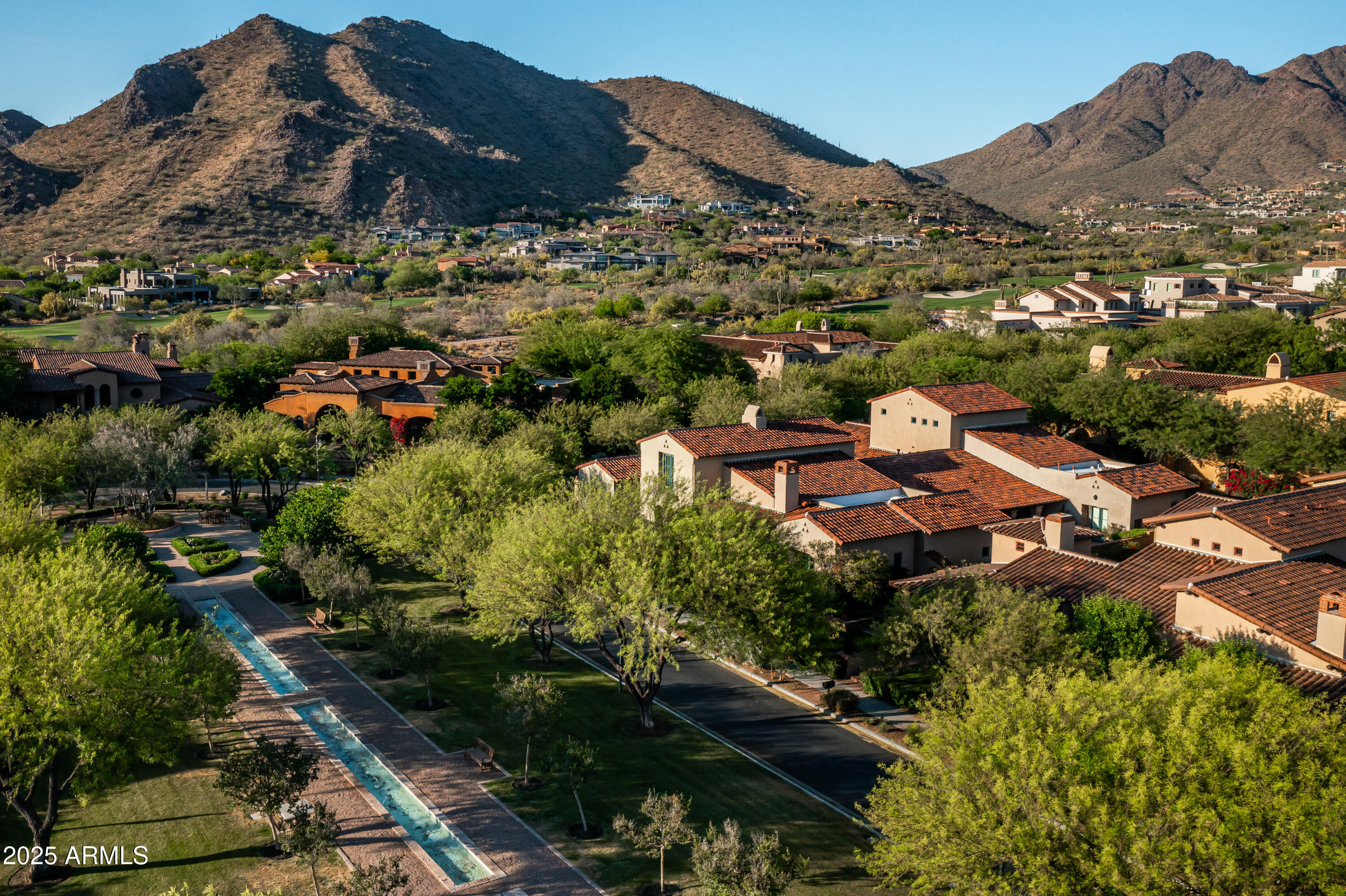 20263 North 102nd Place Scottsdale, AZ 85255 - Photo 58 of 58 an aerial view of residential houses with outdoor space and trees