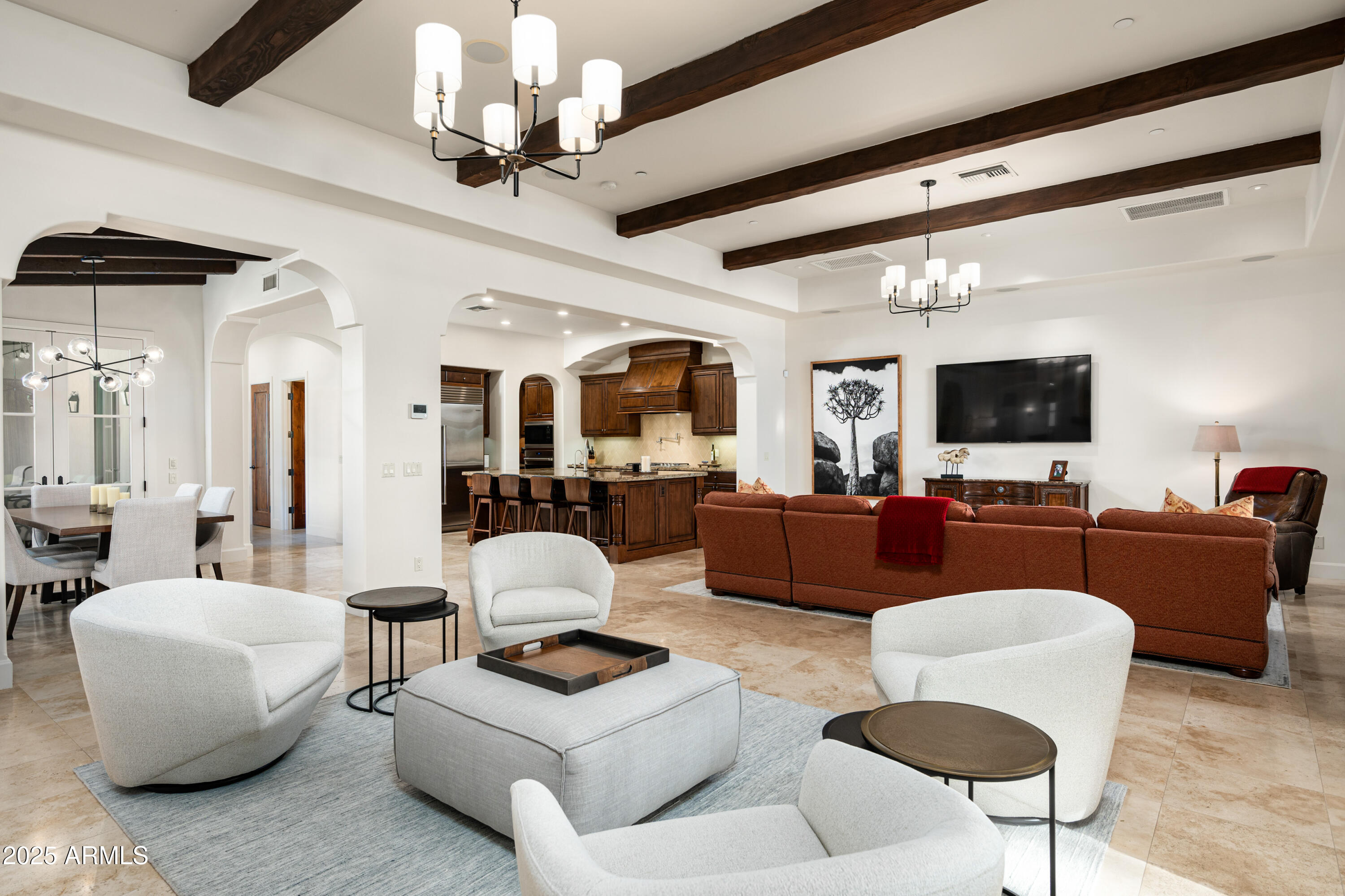 20263 North 102nd Place Scottsdale, AZ 85255 - Photo 8 of 58 a living room with furniture and a flat screen tv
