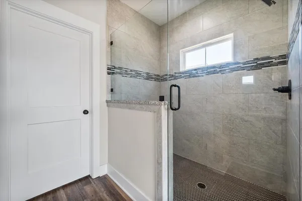 a close view of a shower in bathroom