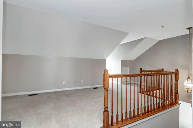 a view of hallway with stairs