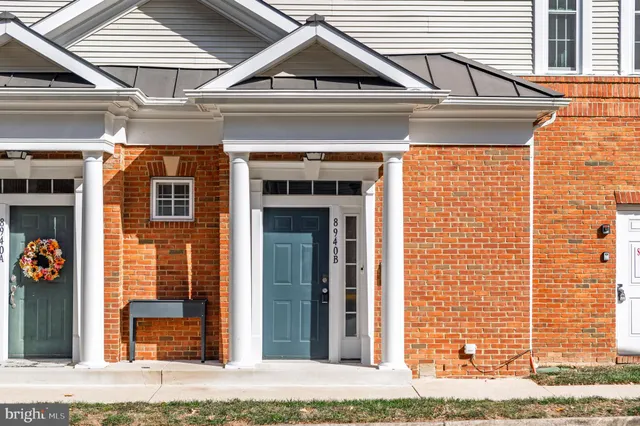 a front view of a house with a porch