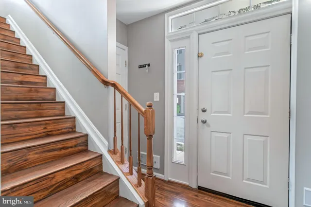 a view of entryway with wooden floor