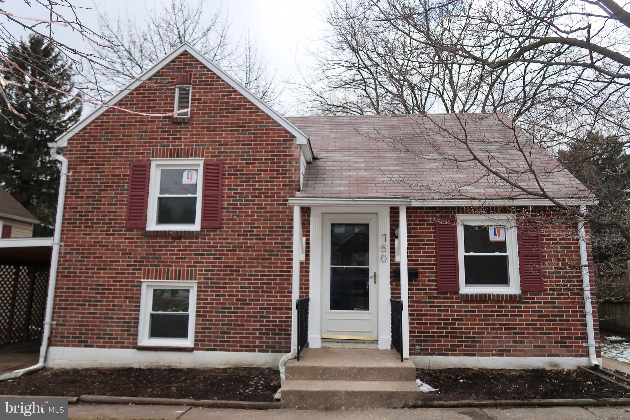 750 Oatman Street York, PA 17404 - Photo 1 of 33 a front view of a house with a yard
