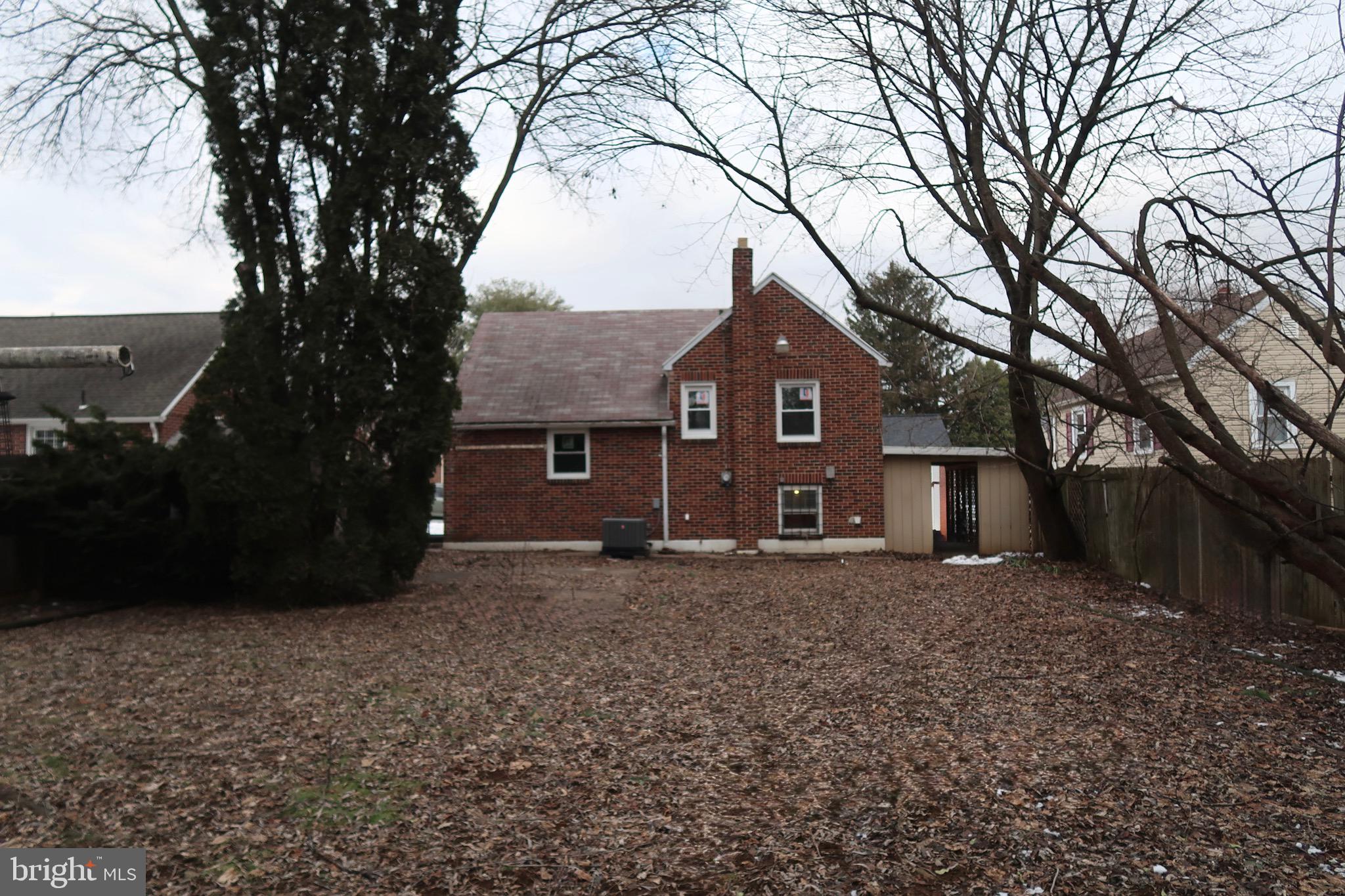 750 Oatman Street York, PA 17404 - Photo 4 of 33 a large tree in front of a house