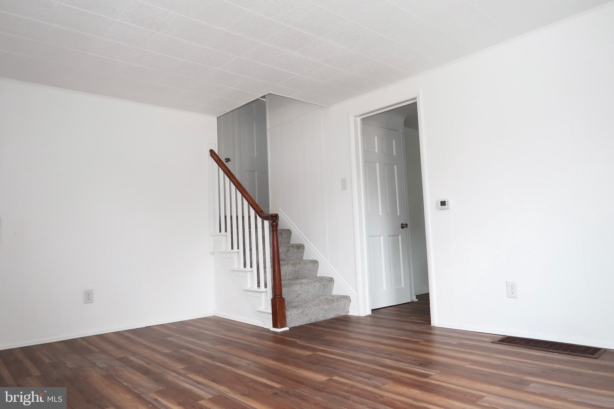 750 Oatman Street York, PA 17404 - Photo 10 of 33 a view of a hallway with wooden floor and entryway