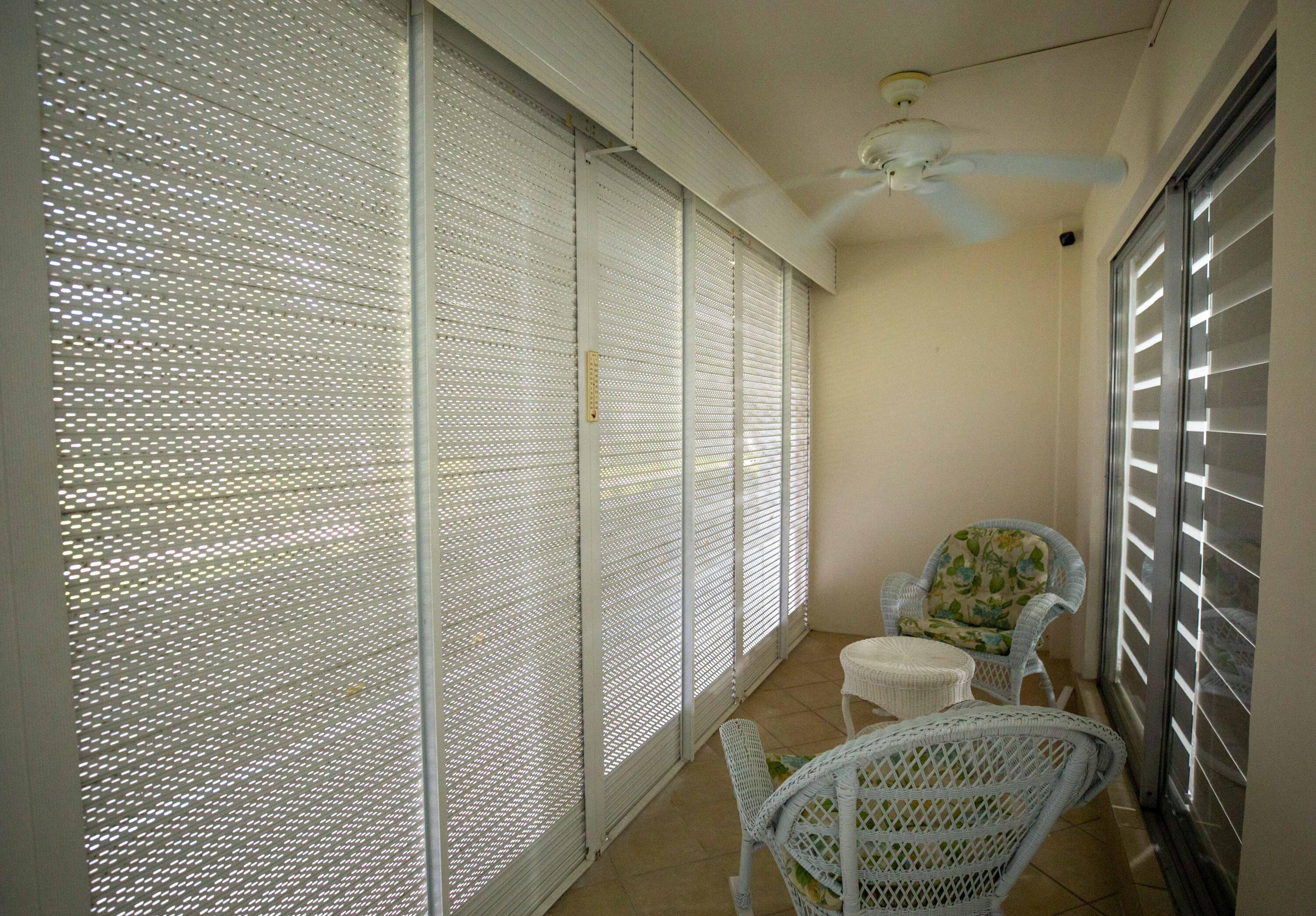250 Northeast 20th Street, Unit 124S Boca Raton, FL 33431 - Photo 12 of 14 a living room with furniture