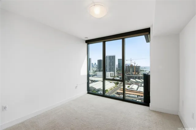 a building view with swimming pool and sitting area